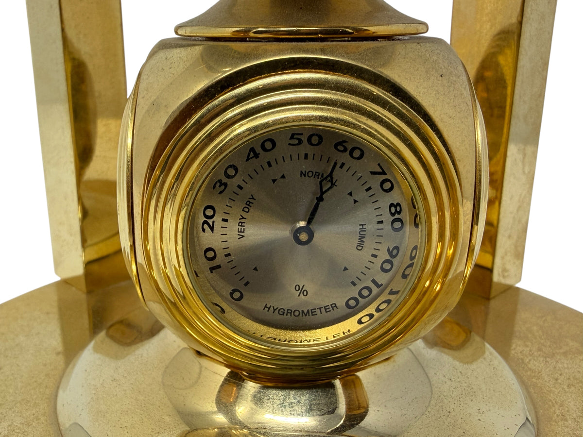 Meridian Collection gemstone world globe with clock, thermometer, and hygrometer, detailed home decor piece in a box.