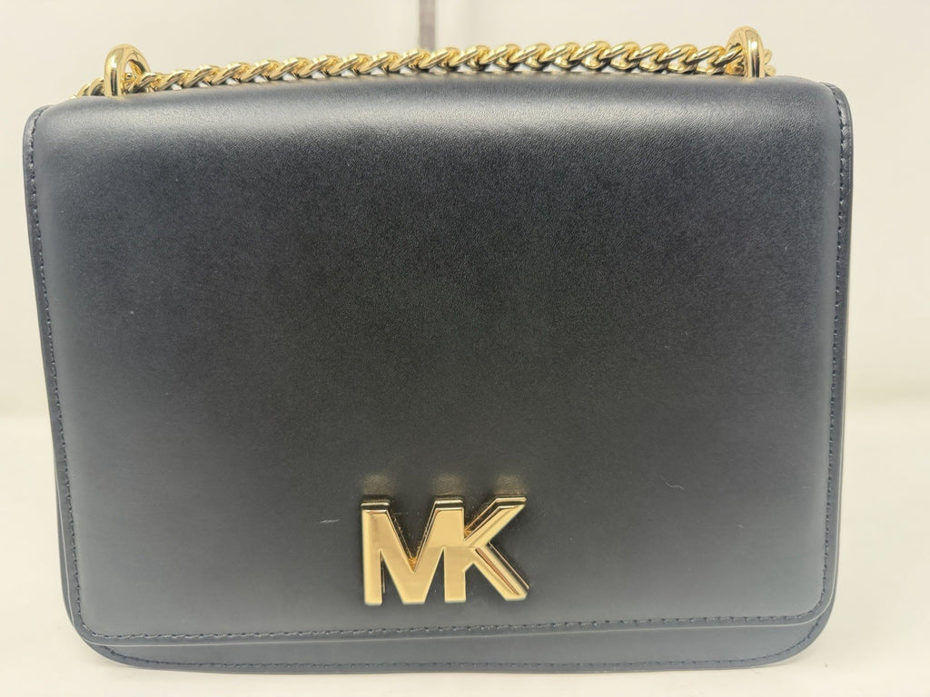 Michael Kors Mott large chain shoulder bag in black leather, front flap and gold MK logo