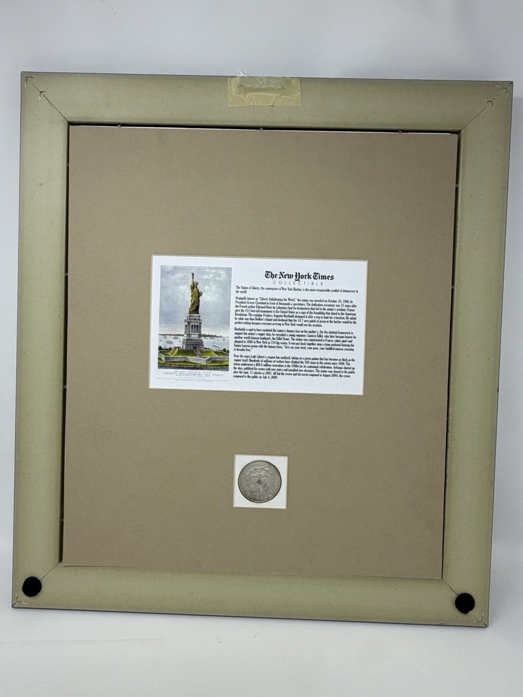 New York Times Statue of Liberty framed display, reverse with information panel and coin window