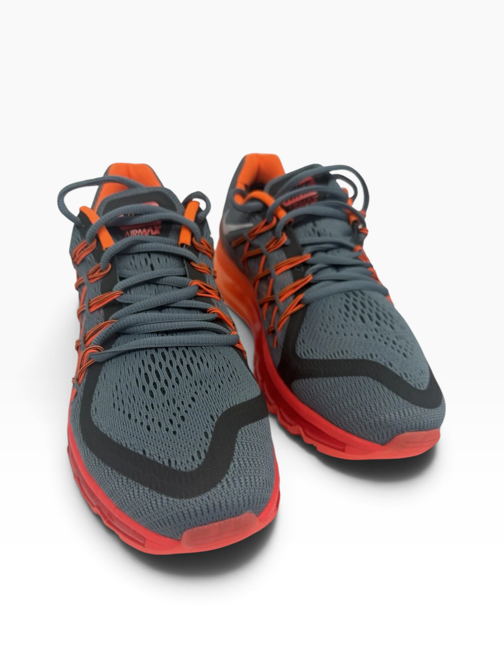 Nike Air Max 2015 men's trainers in grey and orange, showcasing breathable mesh uppers and cushioned sole for athletic comfort.
