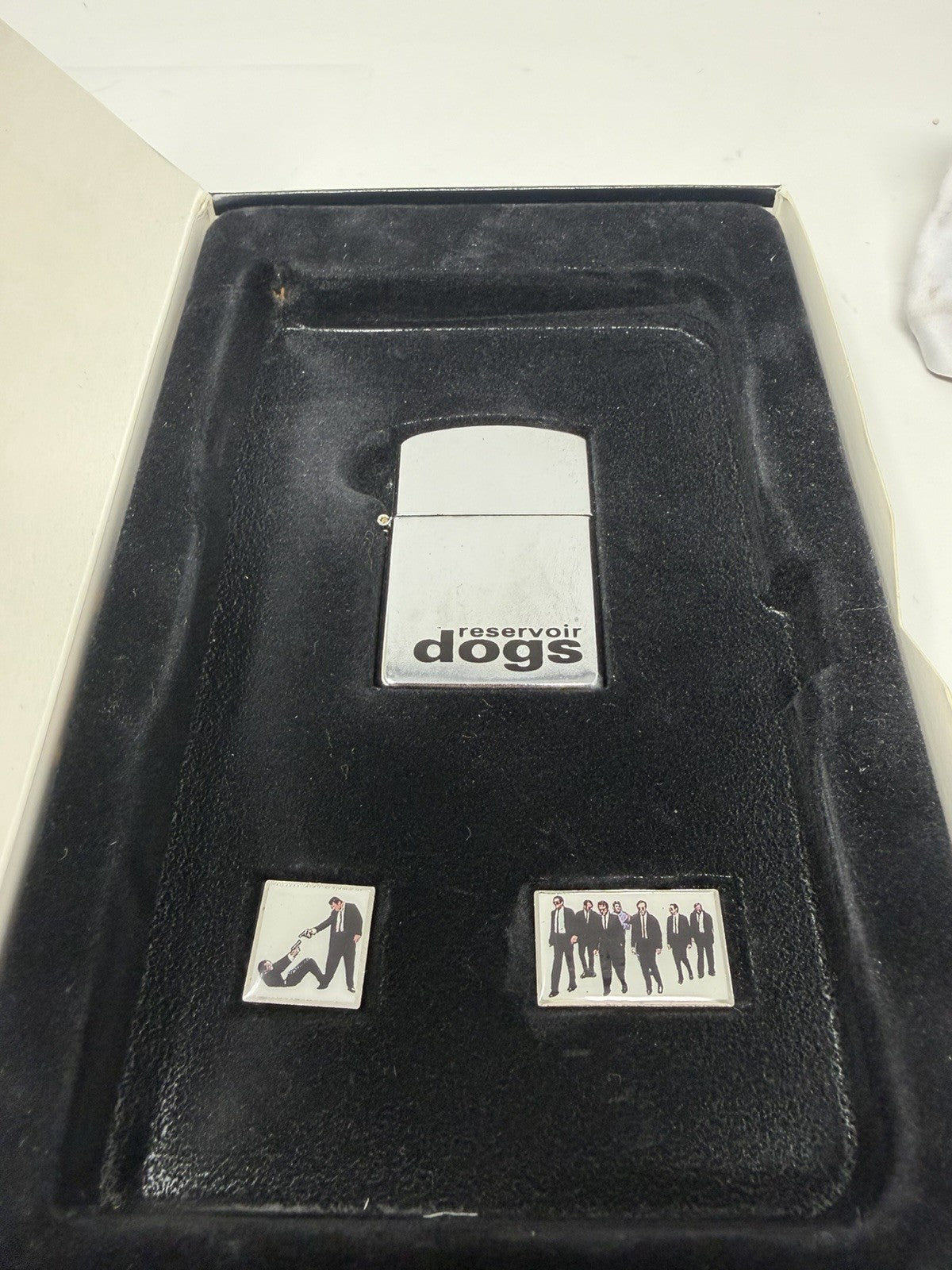 Reservoir Dogs Collector's Edition VHS box set, chrome lighter and pin badges in the tray