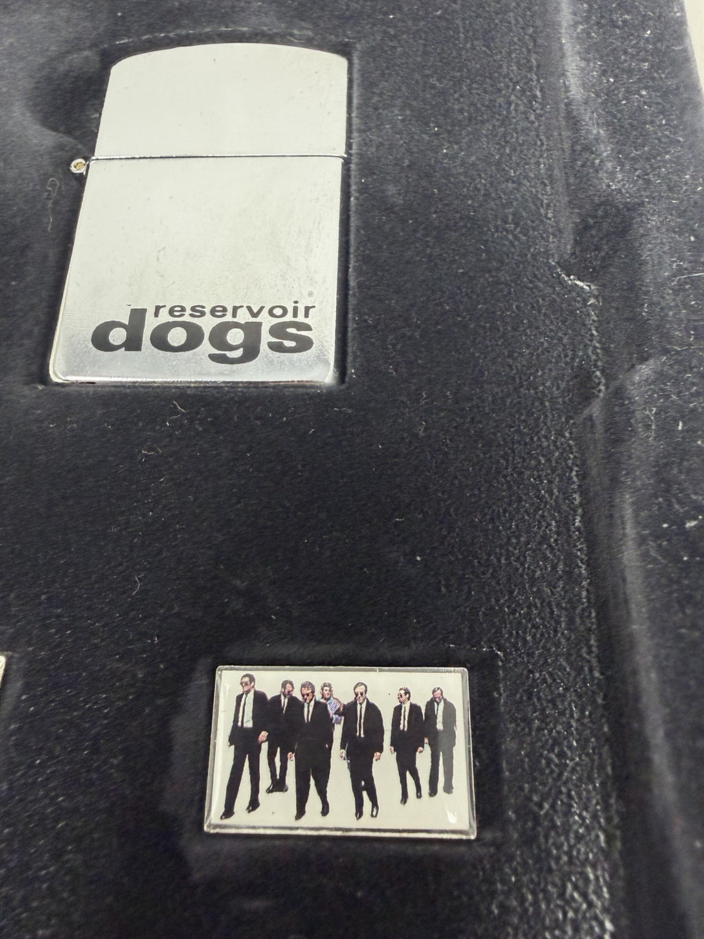 Reservoir Dogs Collector's Edition VHS box set, lighter and pin badge close-up