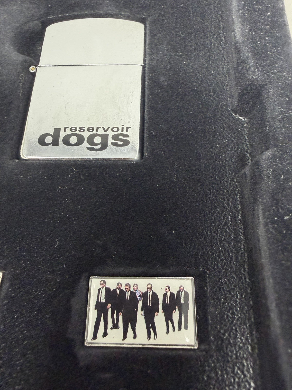 Reservoir Dogs Collector's Edition VHS box set, lighter and pin badge close-up
