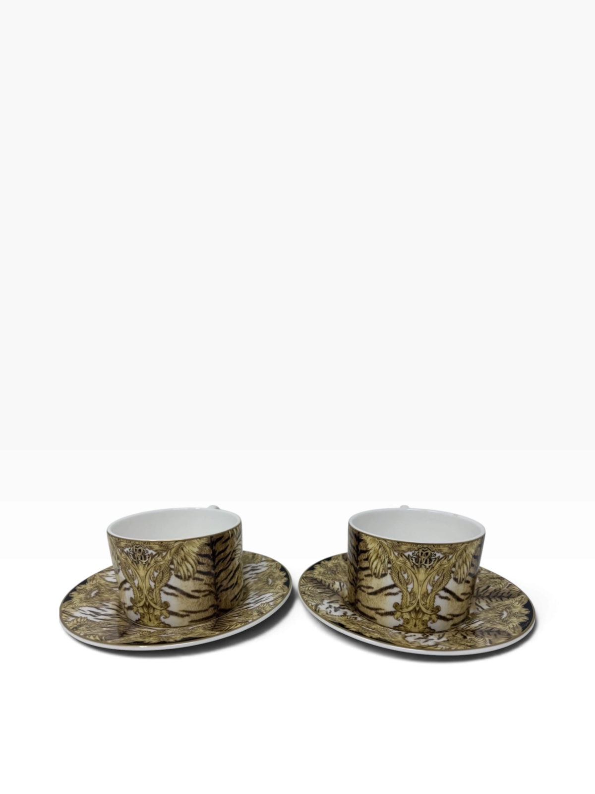 Roberto Cavalli Home tiger wings coffee cup and saucer set with bold tiger wing design on elegant tableware.