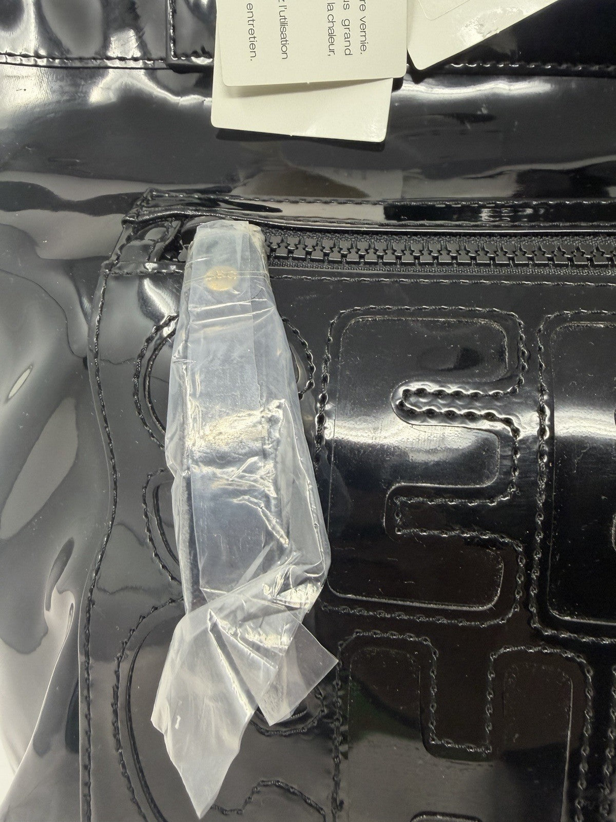 See By Chloé large black patent logo tote shopper with spacious interior, durable handles, dust bag, and included card.