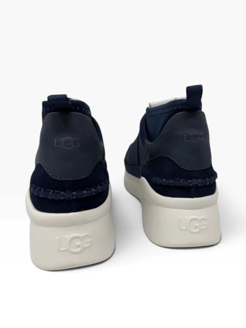UGG Neutra women's slip-on trainers in navy, UK 6, EU 39, casual footwear with comfortable design and stylish look.
