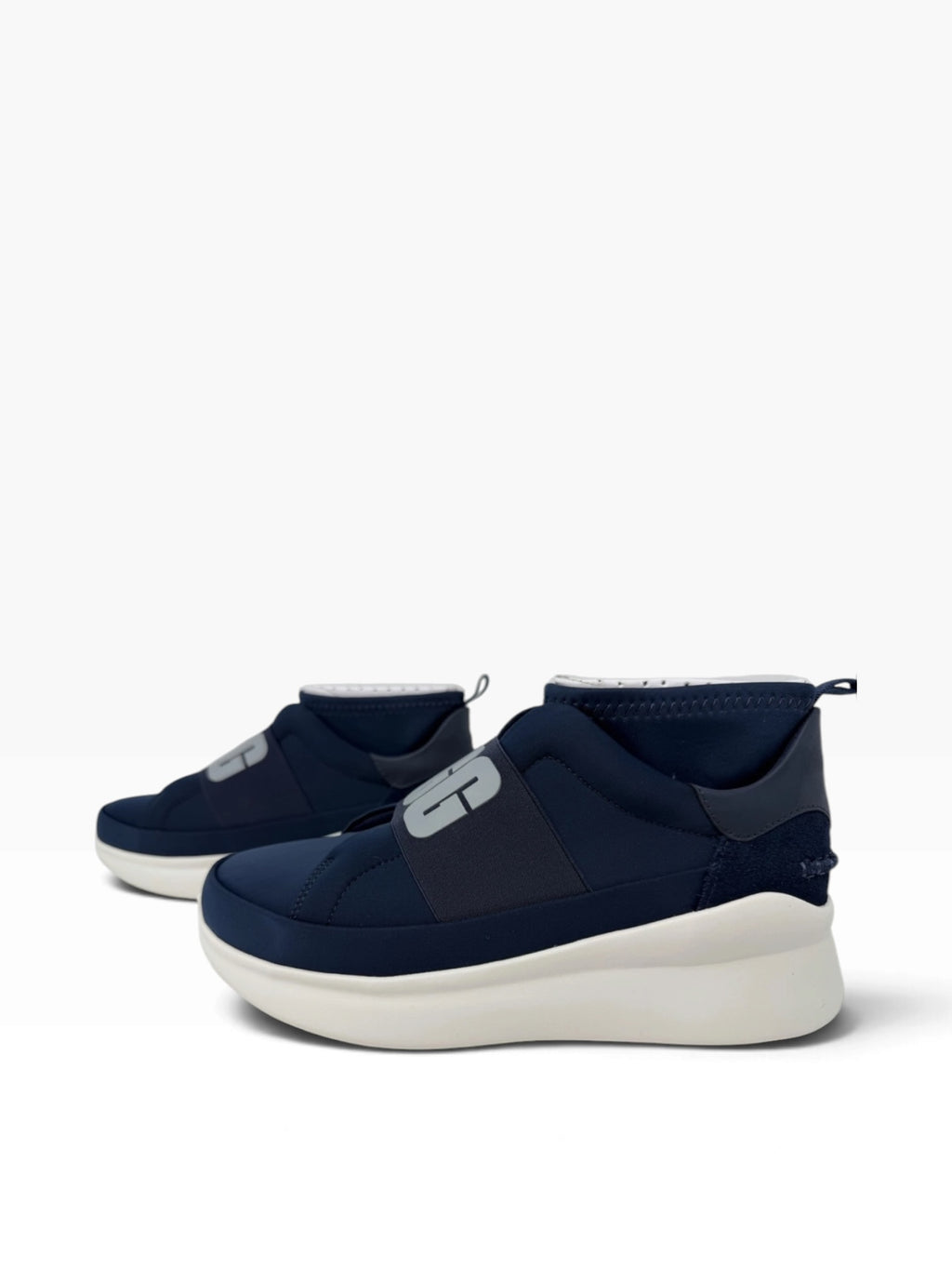 UGG Neutra women's slip-on trainers in navy, UK size 6, featuring a casual sneaker design and comfortable slip-on style.