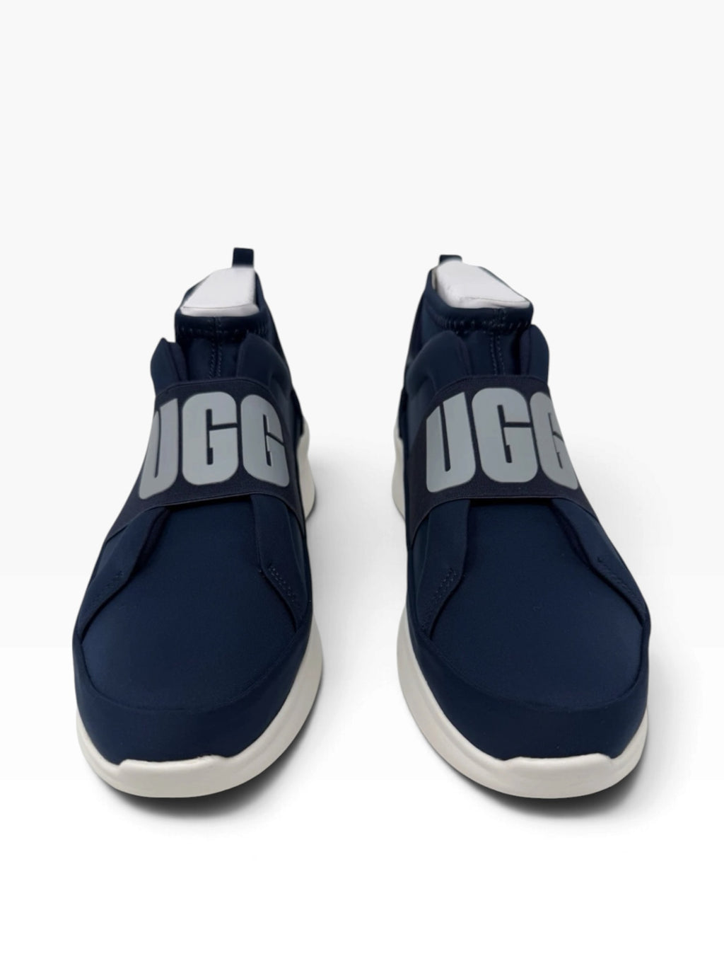 UGG Neutra women's slip-on trainers in navy, UK 6, featuring a sleek design and comfortable casual footwear style.