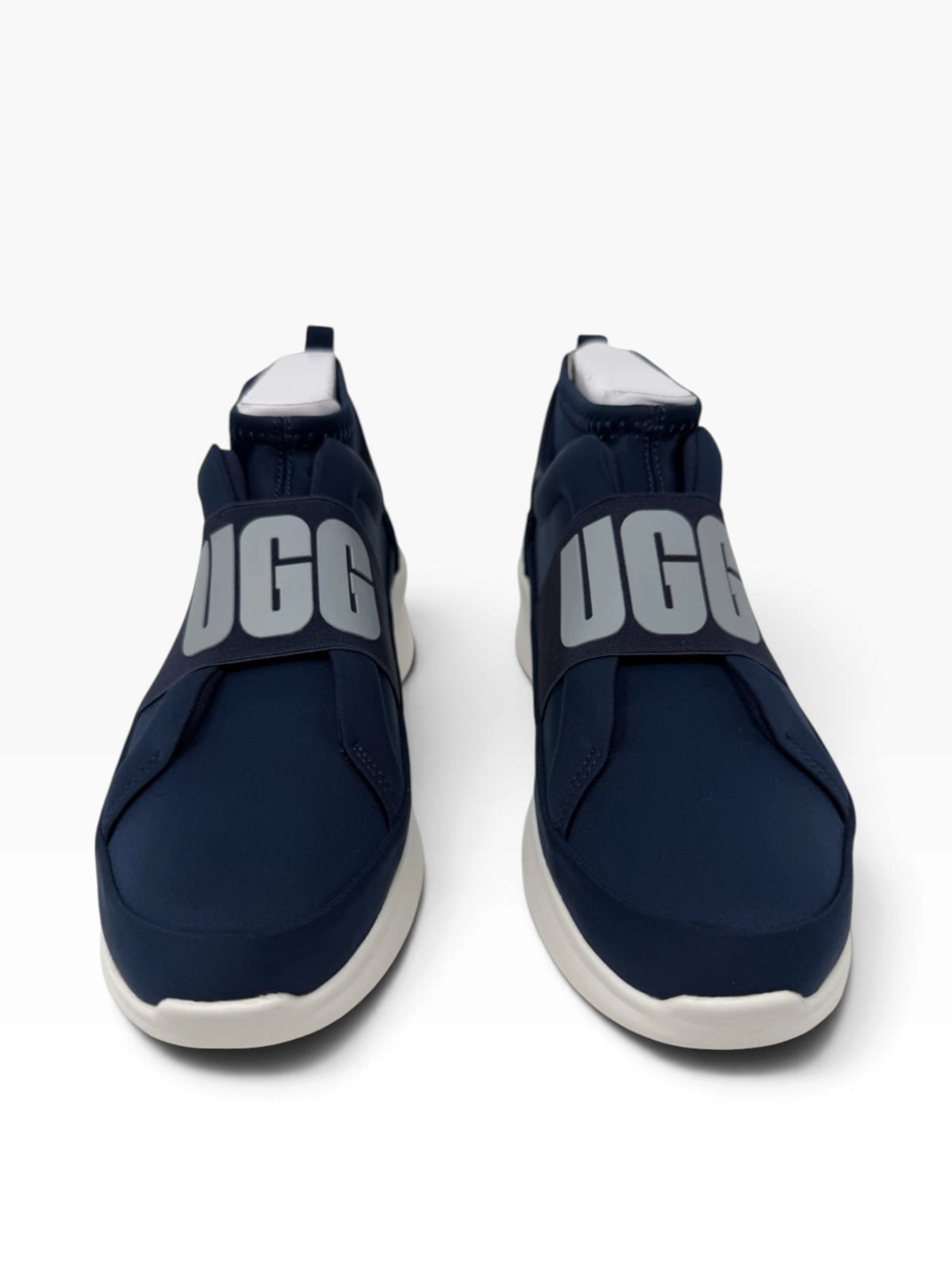 UGG Neutra women's slip-on trainers in navy, UK 6, featuring a sleek design and comfortable casual footwear style.