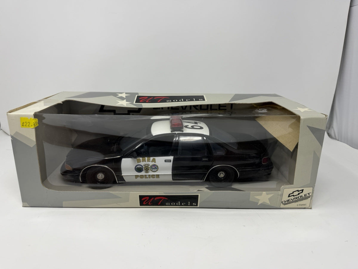 UT Models 1:18 Chevrolet Caprice Brea Police model inside its original UT Models window box