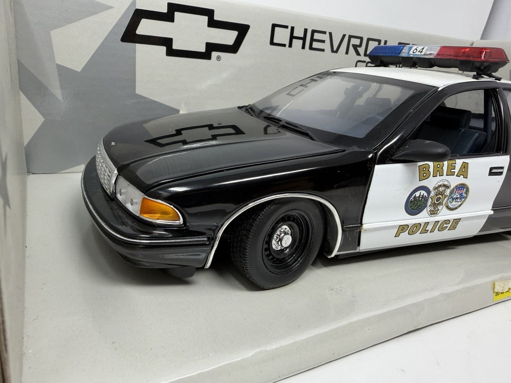 UT Models 1:18 Chevrolet Caprice Brea Police, front three-quarter view with Brea Police door crest