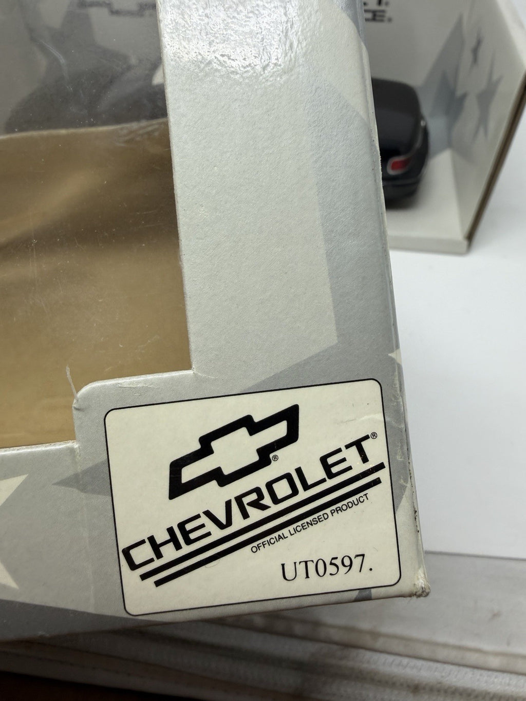 UT Models 1:18 Chevrolet Caprice Brea Police box corner with Chevrolet licence logo and reference UT0597