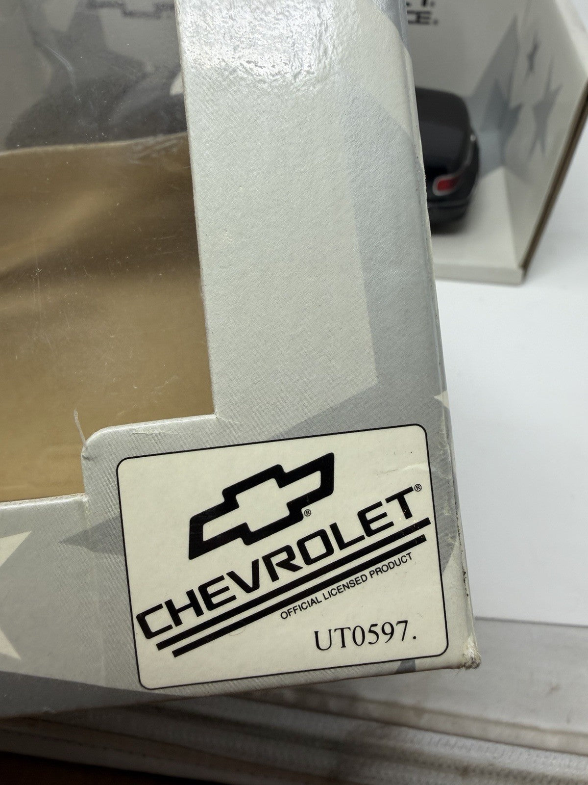 UT Models 1:18 Chevrolet Caprice Brea Police box corner with Chevrolet licence logo and reference UT0597